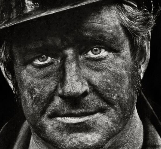 coal miner with coal dust on face